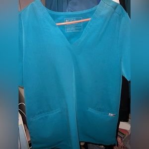 Women’s L Figs Pacific blue Technical Collection set.